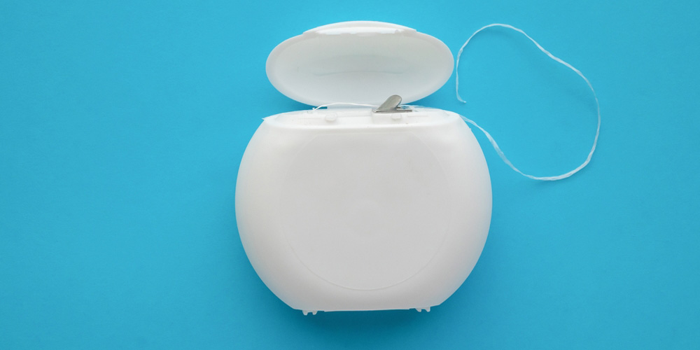 نحوه استفاده از نخ دندان