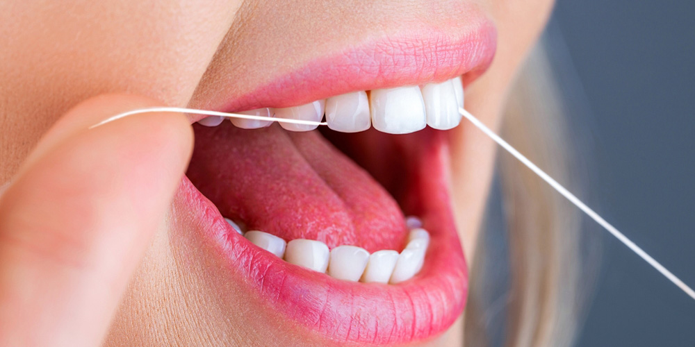 نخ دندان، کلید پاکیزگی بین دندان‌ها و سلامت دهان